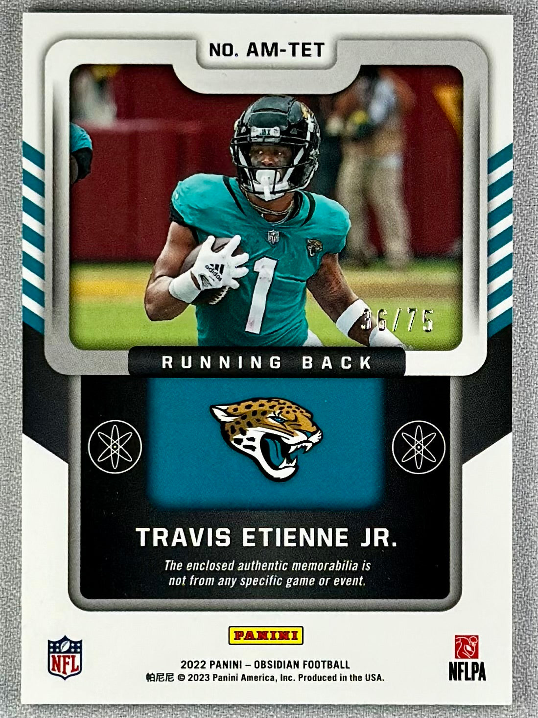 2022 Panini Obsidian Travis Etienne Jr. Atomic Material Orange /75 #AM-TET